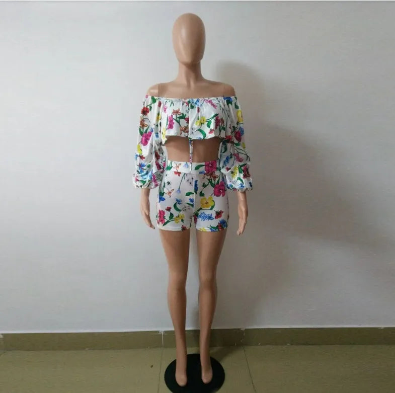 Women's multicolour digital print two-piece suit with a pile sleeve jacket and matching shorts.
