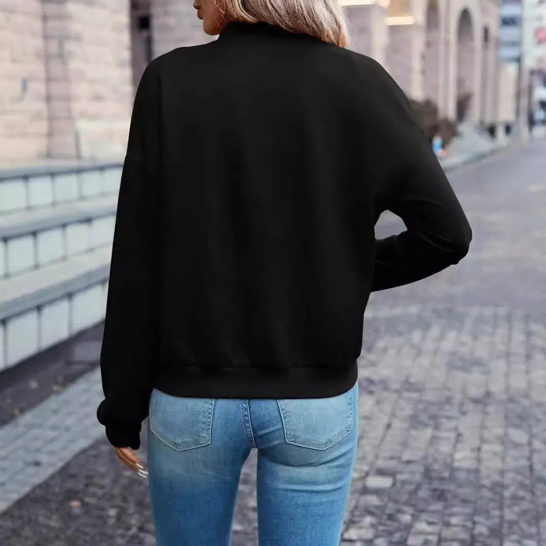 Black women's casual zip jacket with long sleeves and faux pocket detail.