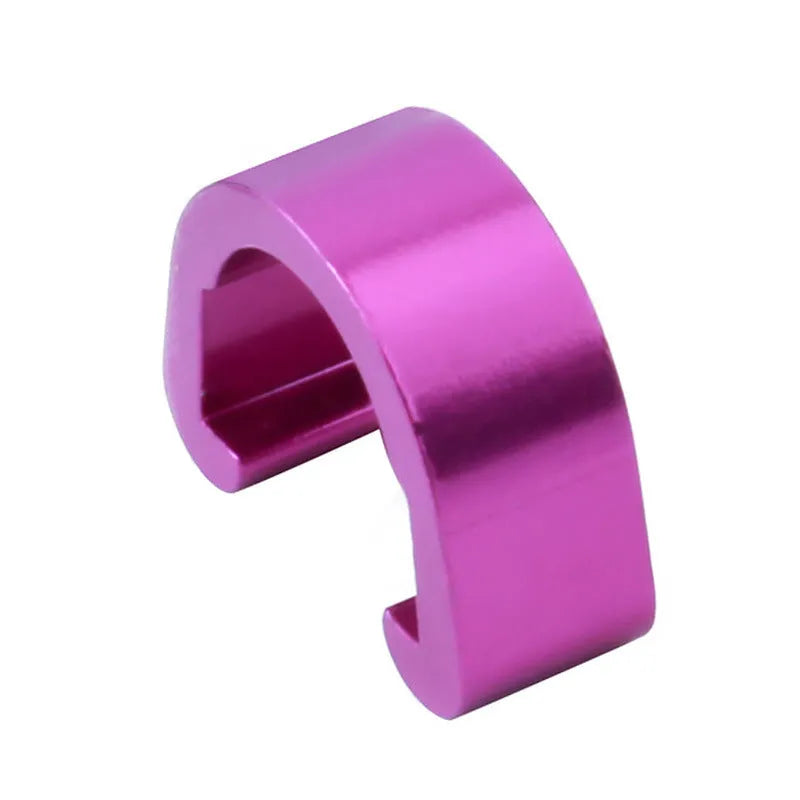 Ten small aluminium alloy C-shaped buckles in assorted colours on a white background.