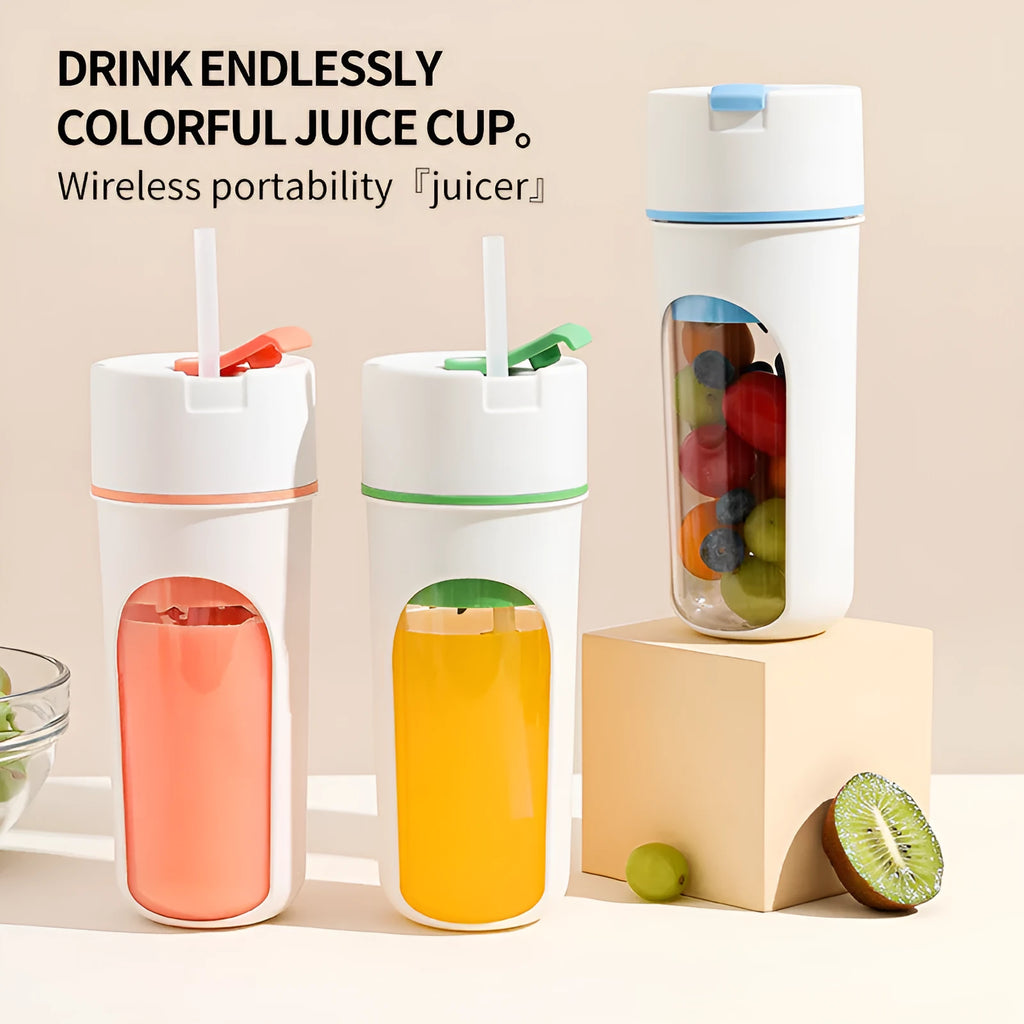 Blue portable electric juicer with USB charging cable next to a cup of blended fruit smoothie.