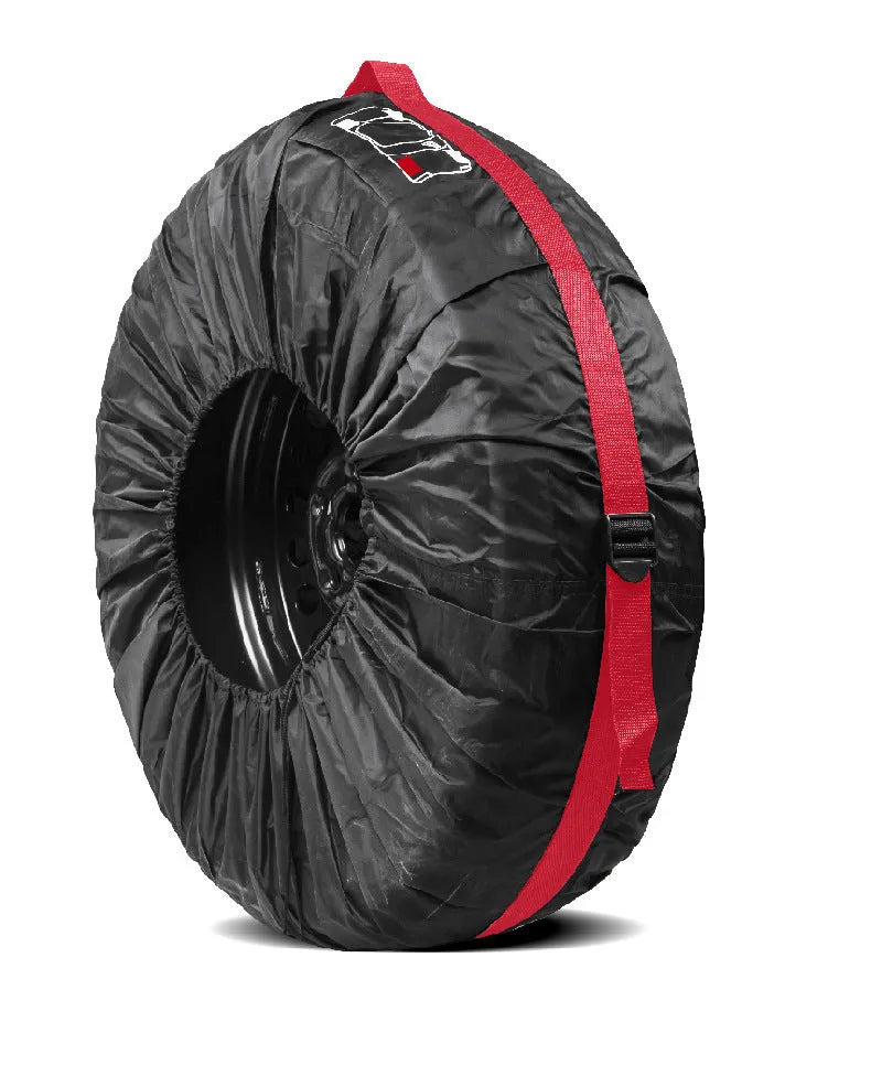 Four black Oxford cloth polyester tyre protective covers laid flat, showing their circular shape.