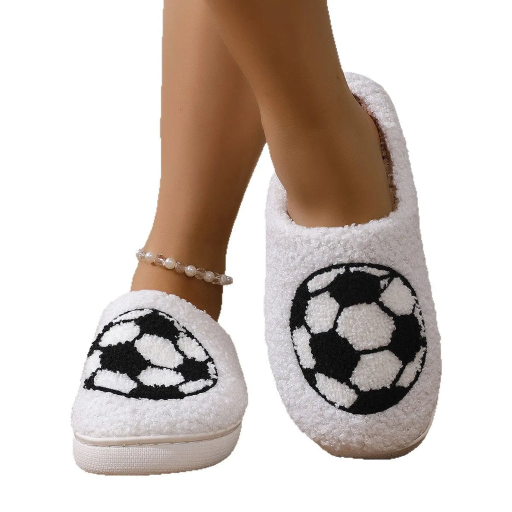 White thermal cotton slippers with ethnic totem pattern, plush upper, and TPR sole on a floor