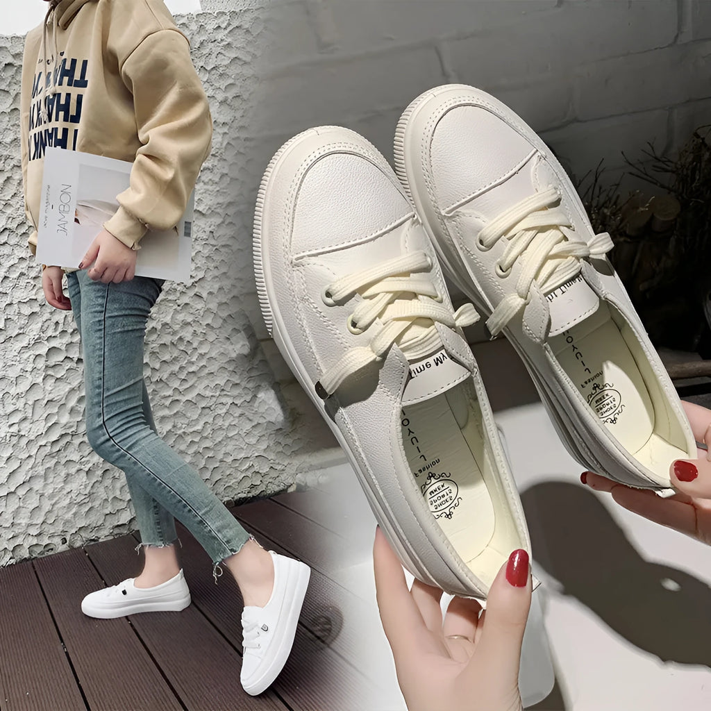 Women's casual lace-up shoes in white with round toe and rubber sole, side view