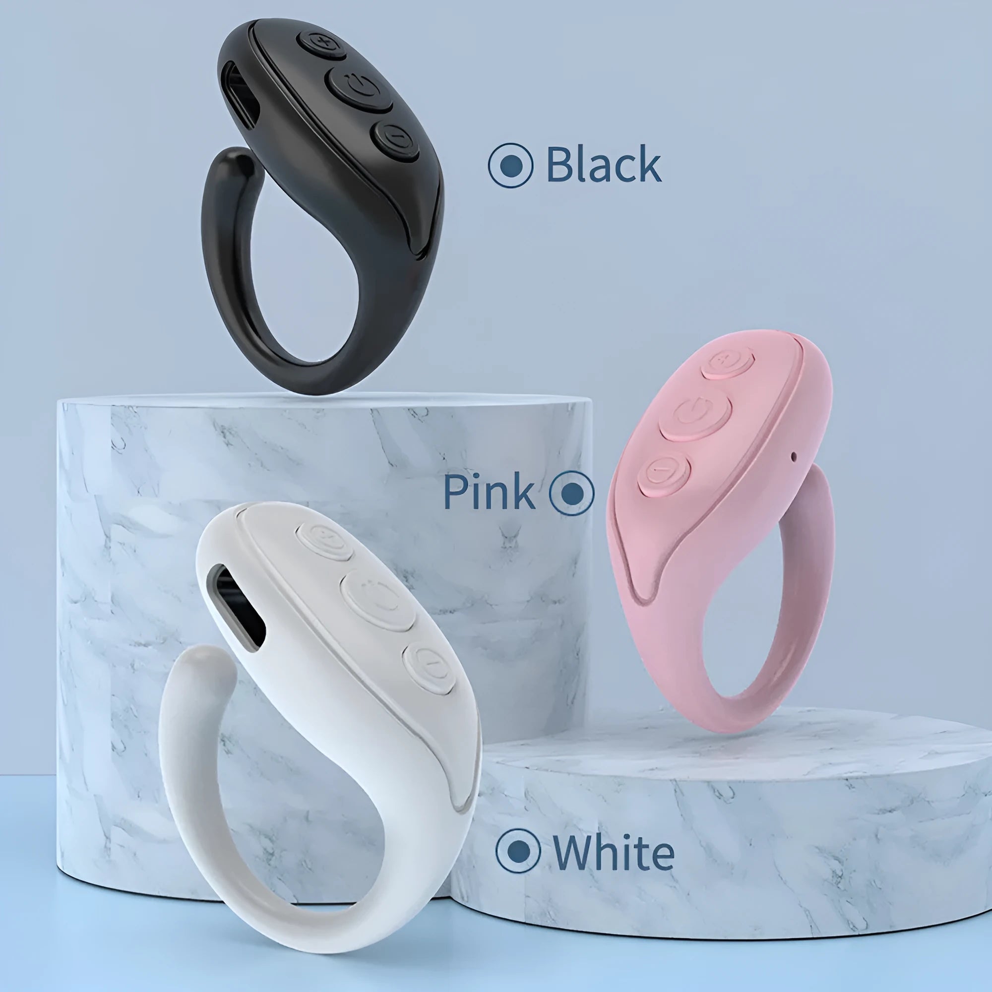 Mobile phone Bluetooth remote control in black, white, and pink with 50mAh battery and V5.3 chip