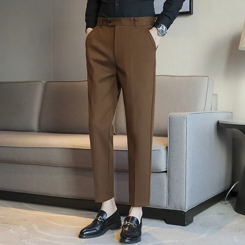 Men's straight cut brown corduroy trousers with elastic waistband shown front and side view