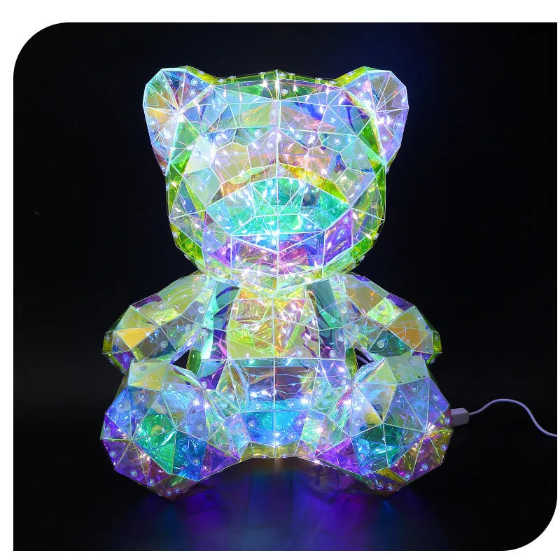 Illusory Glow Christmas Tree decoration in PET material with USB cable, glowing on a festive tabletop