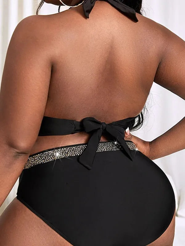 Black plus size women's bikini swimsuit set with bra and shorts, shown on a mannequin.