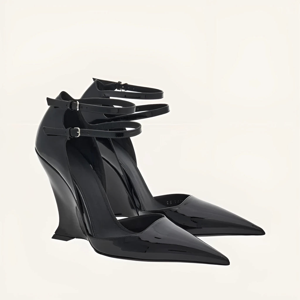 Women's pointed high heels in black with buckle strap and PU upper, side view
