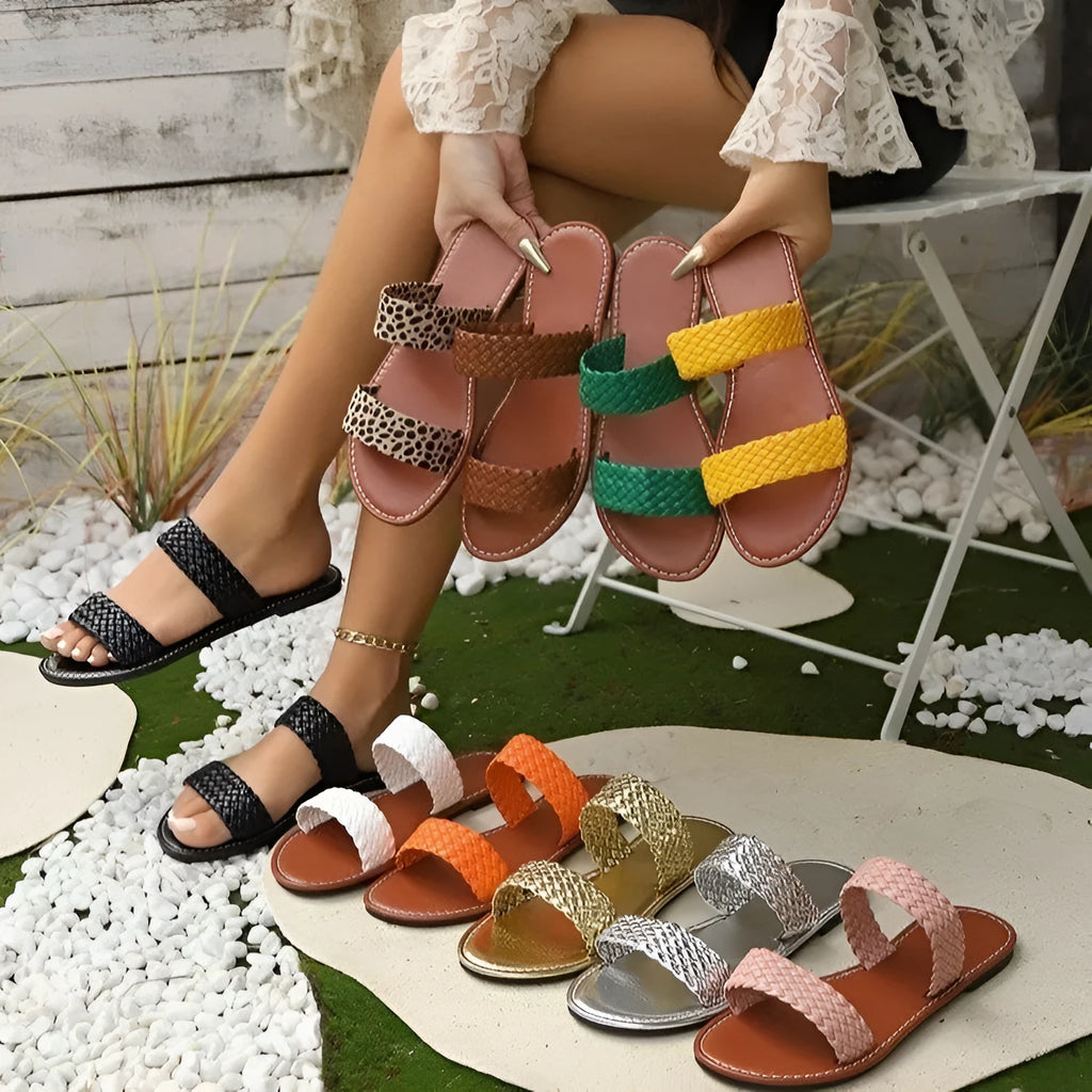 Women's plus size woven beach slippers in synthetic leather with PVC soles available in multiple colours