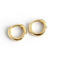 Women's sterling silver round stud earrings in gold and silver finishes