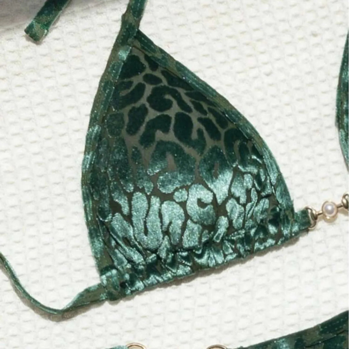 Blue leopard print women's swimsuit bikini set on a mannequin.