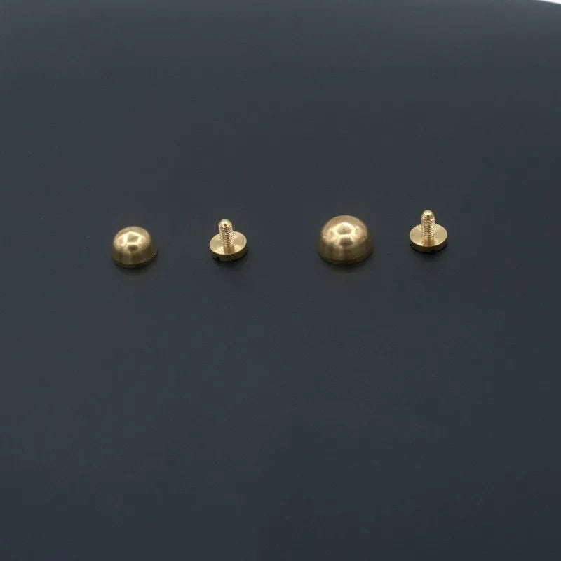 Brass decorative buckle showing round and bucket foot nail styles in 10x6mm and 12x7mm sizes