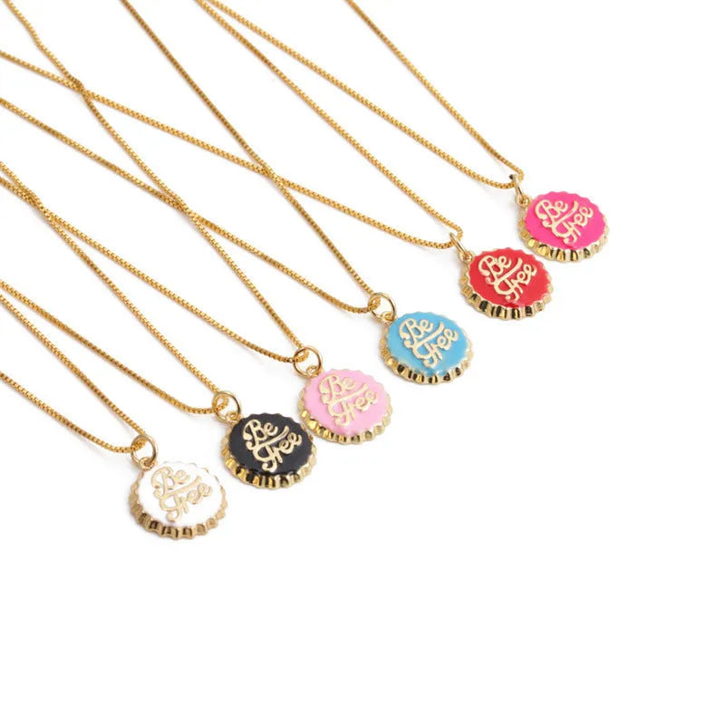 Gold plated copper bottle cap pendant necklace on a 40cm box chain.