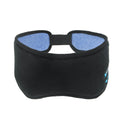A black wireless Bluetooth sleep mask with built-in small earphones, shown on a model, designed for comfortable, pressure-free music listening during rest.