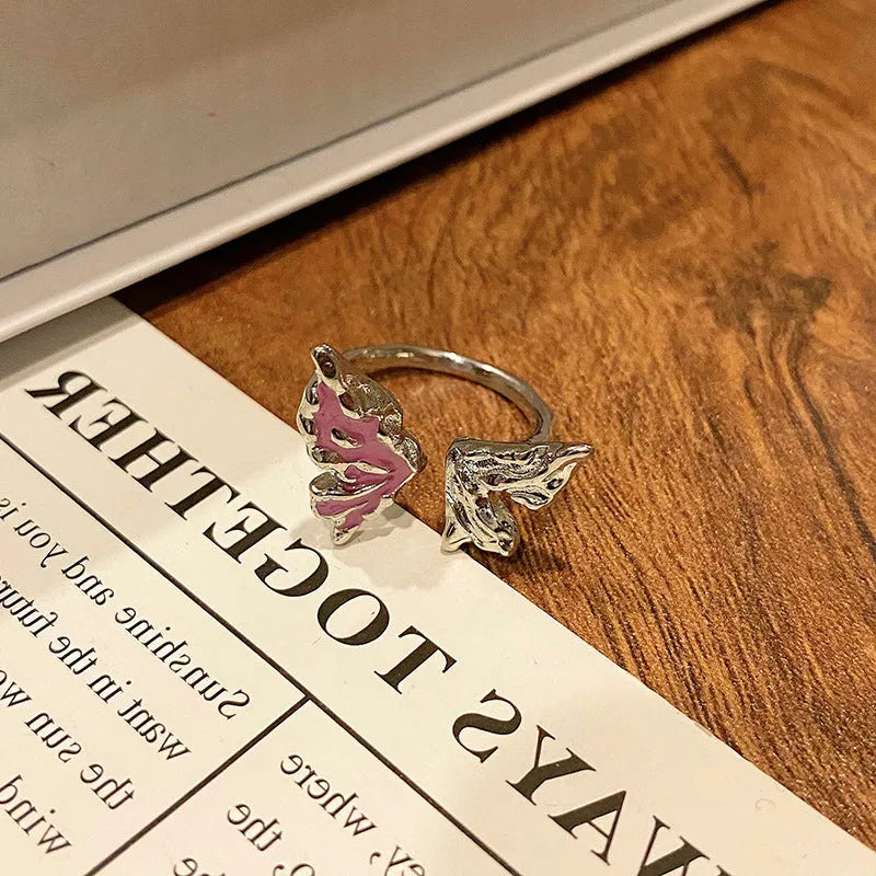 Simple copper women's ring with a Chinese butterfly design, showing an example from the 33 available numbered styles.