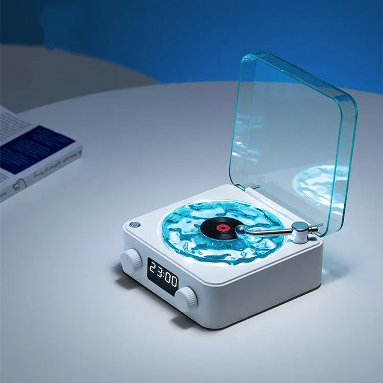 Retro turntable Bluetooth speaker with rotating vinyl and RGB projection lighting effects