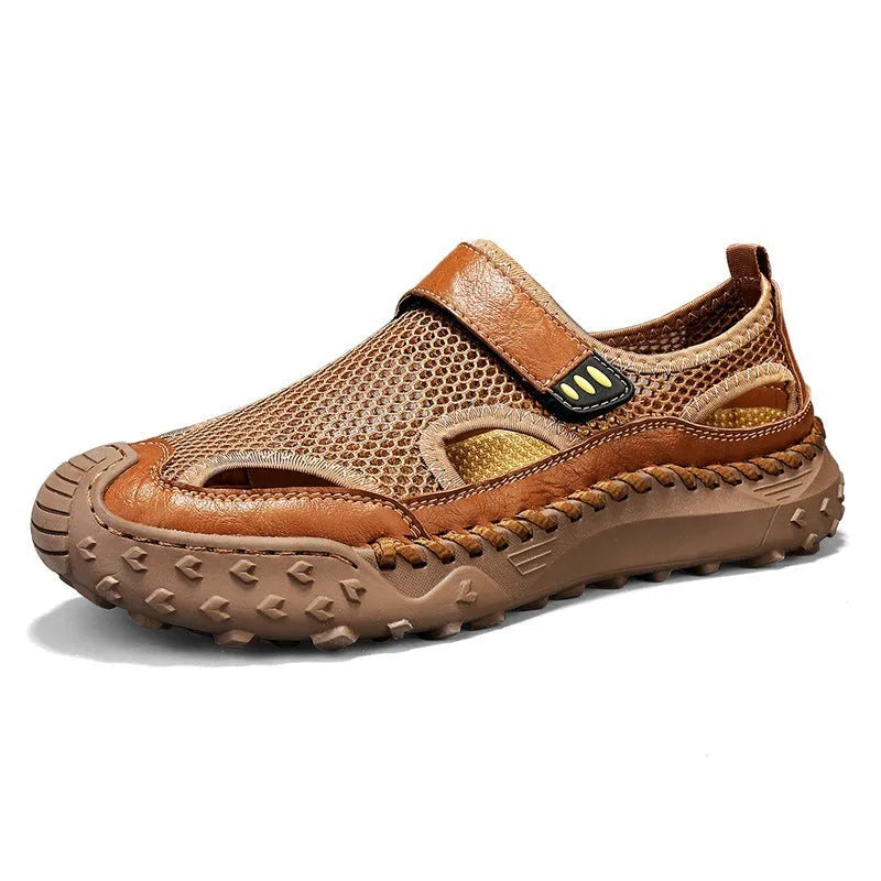 Men's casual sandals with black mesh upper, rubber sole, and adjustable Velcro strap.