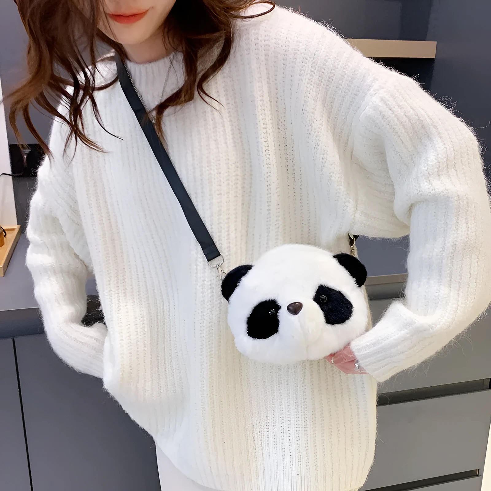 Soft plush Panda Head design cylindrical crossbody bag showing front view and pocket.