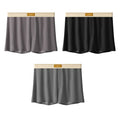 Men's loose fit ice silk underwear in solid colours showing mid-waist design and knitted fabric texture
