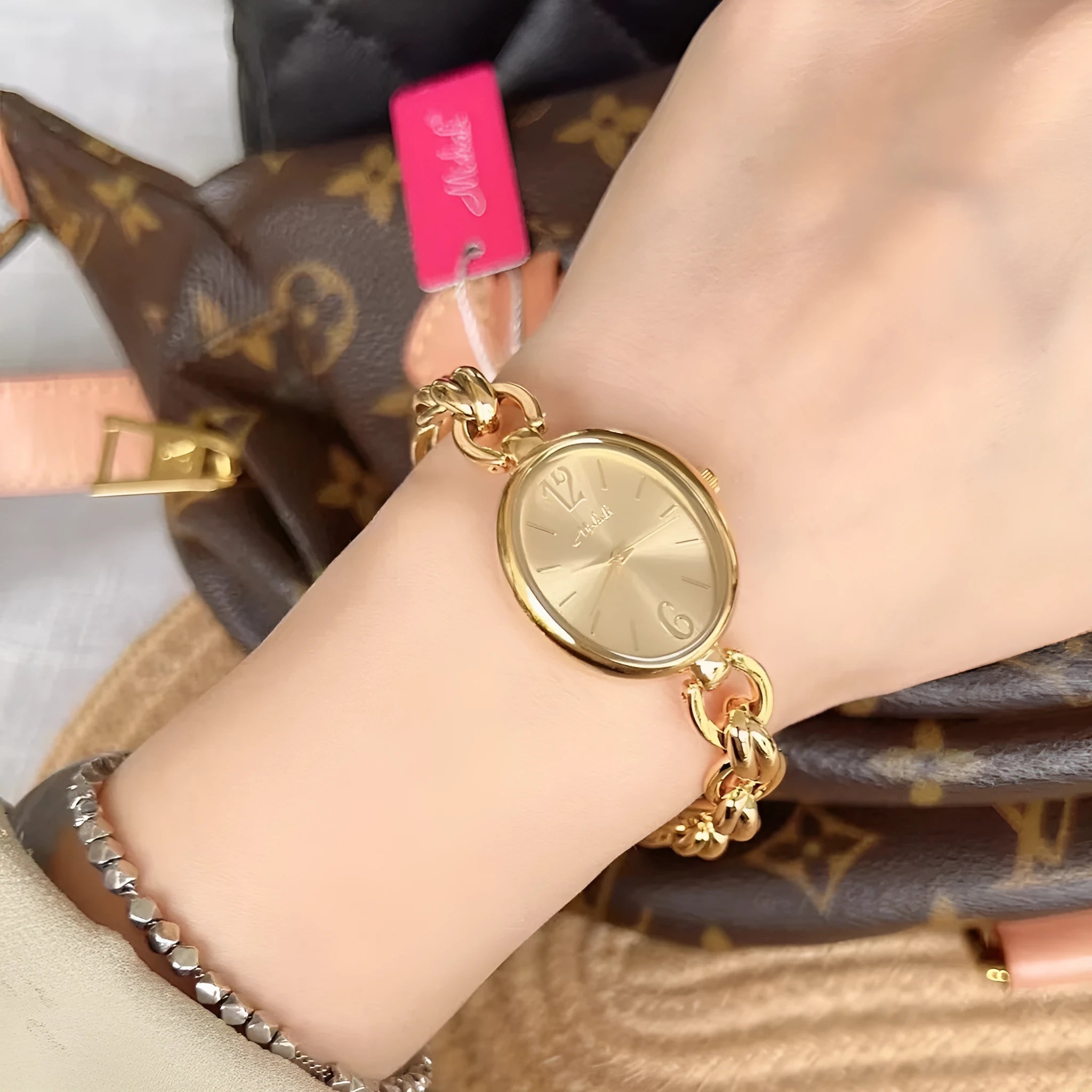 Ladies steel strap watch with oval hollow chain, silver case, white face, casual style