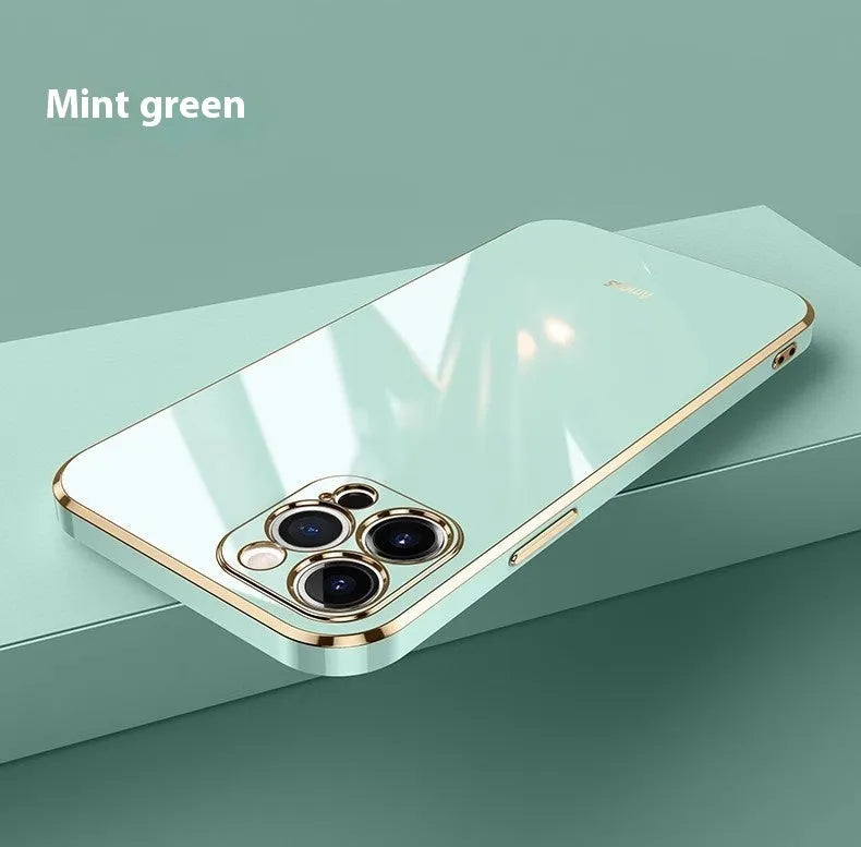 iPhone 15 Pro in a mint green TPU phone case with a silver electroplated edge on a white surface.