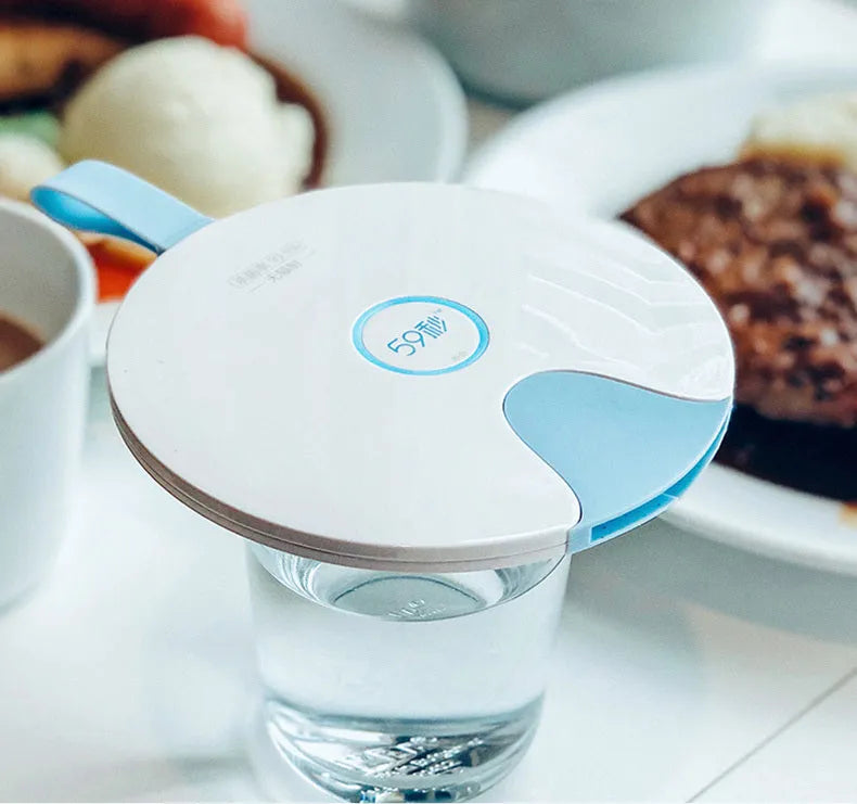Compact blue or pink portable UV baby bottle sterilizer showing USB port and dimensions.