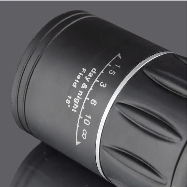 Black 16x52 high-power monocular with enhanced green film HD optics for day and night use.