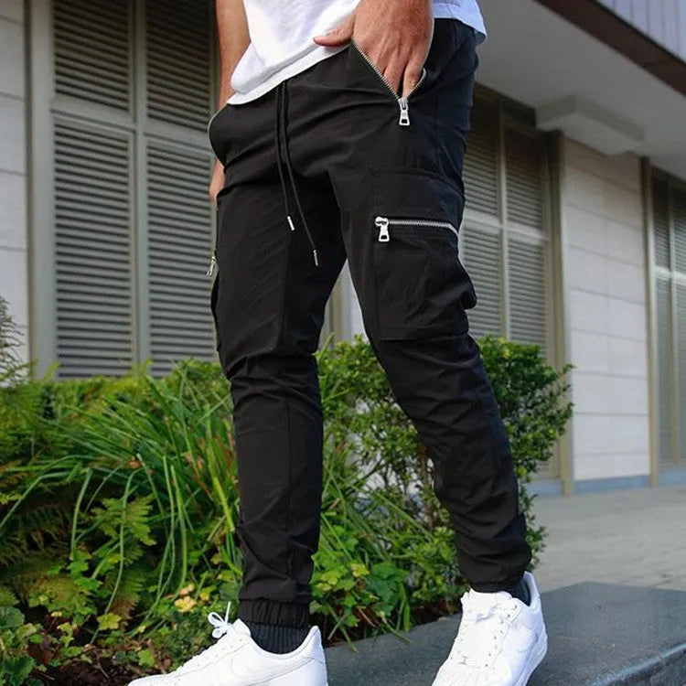 Men's zipper multi-pocket loose fit trousers in black, 95% polyester chemical fiber blend, with belt and small leg opening