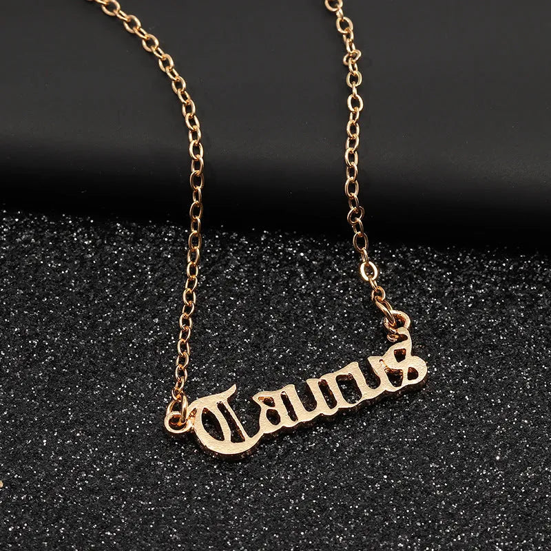 Zodiac Old English pendant necklace in alloy, showing astrology sign in classic font, lightweight jewellery