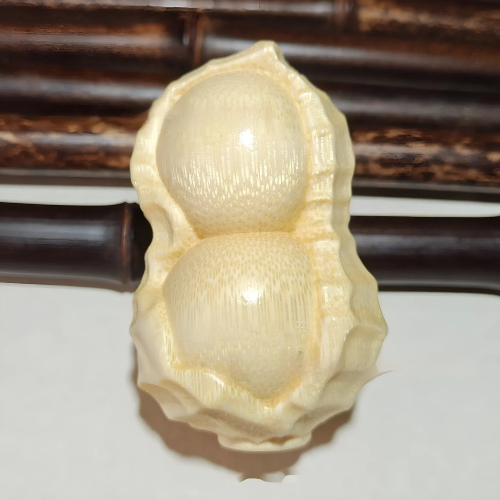 Natural solid bamboo peanut carving ornament with 'May Good Things Happen' inscription