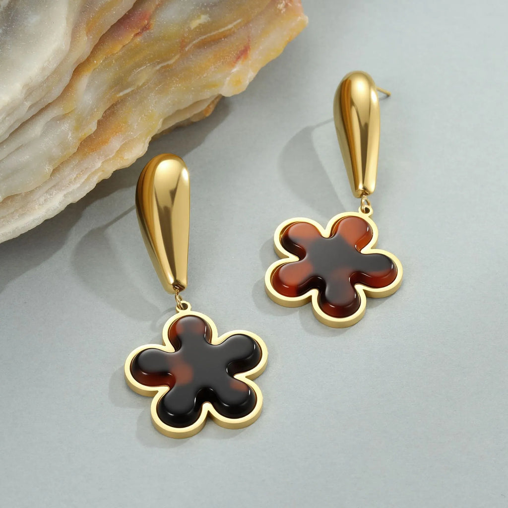 Tortoiseshell resin Hawksbill colour earrings in heart or flower shape made from 18K stainless steel.