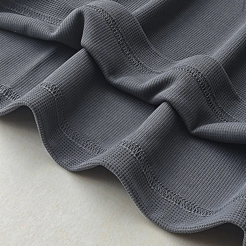 Men's dark grey heavy waffle texture short sleeve t-shirt on a hanger