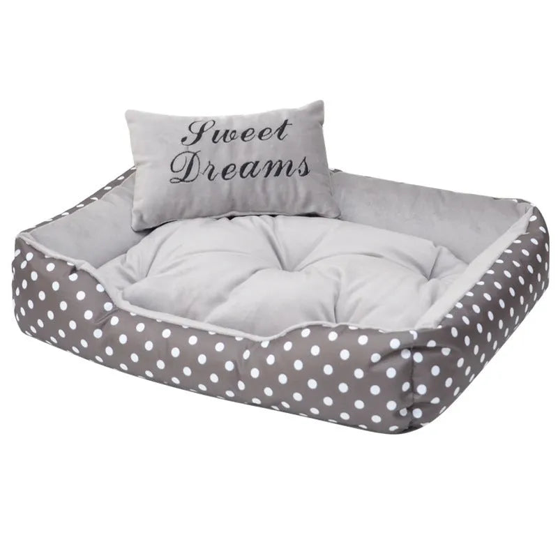 Small polka dot dog bed with a matching square pillow, shown in rose red colour