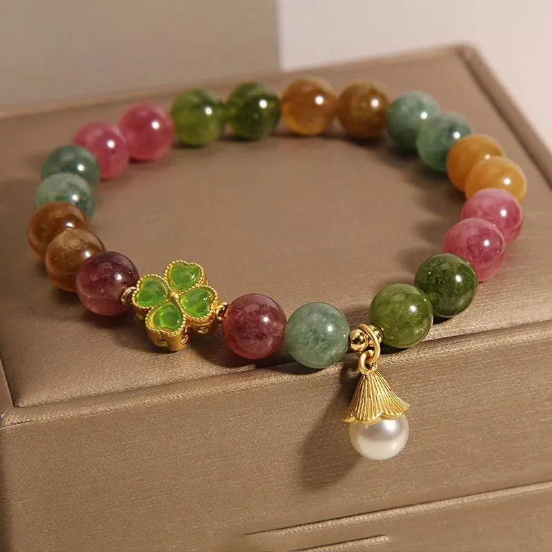 Colourful tourmaline bracelet with four-leaf clover pearl pendant in geometric drop shape