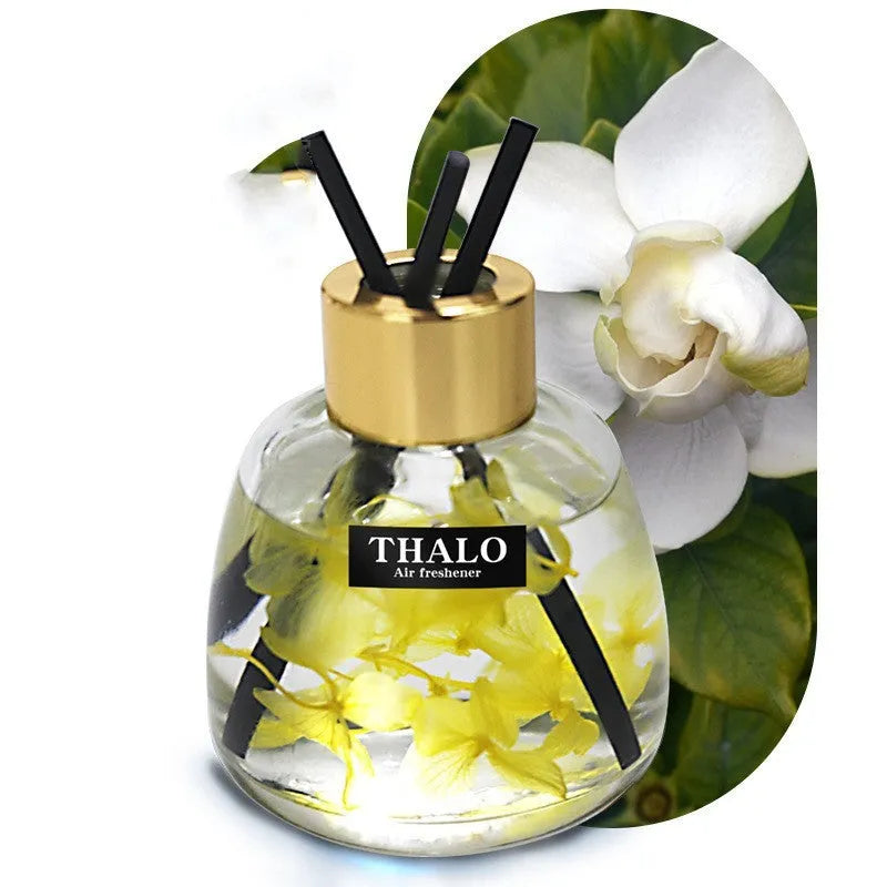 Glass bottle car perfume ornament for vehicle aromatherapy in decorative design.