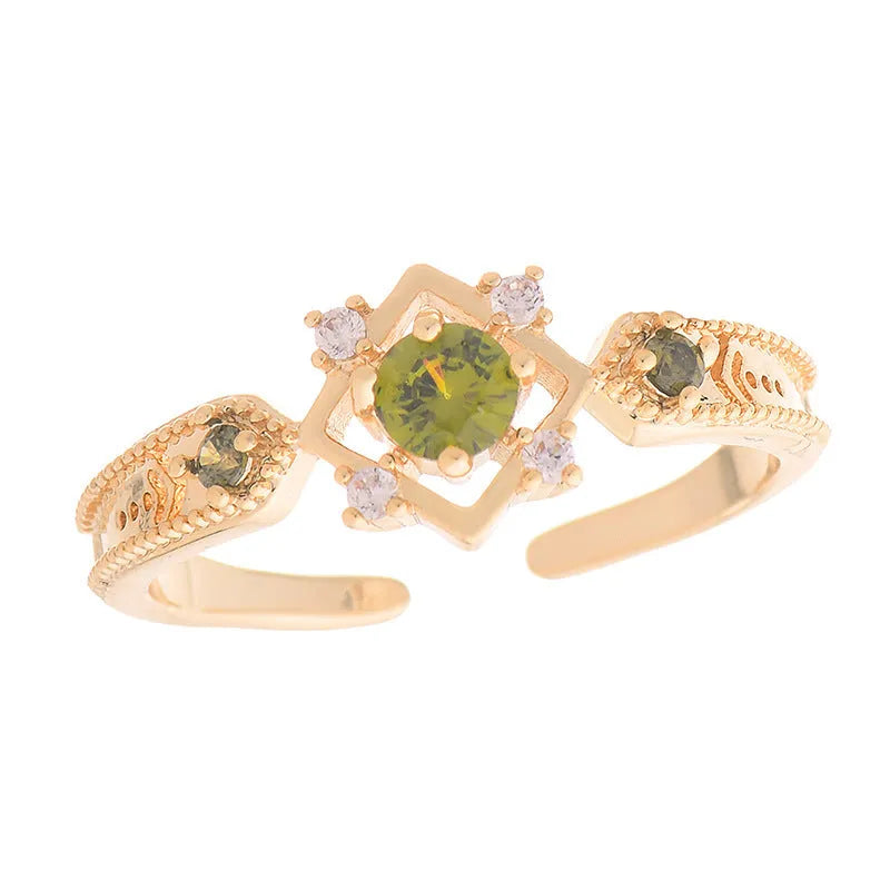 Open mouth geometric ring with round zircon stones on copper band, available in purple or olive green