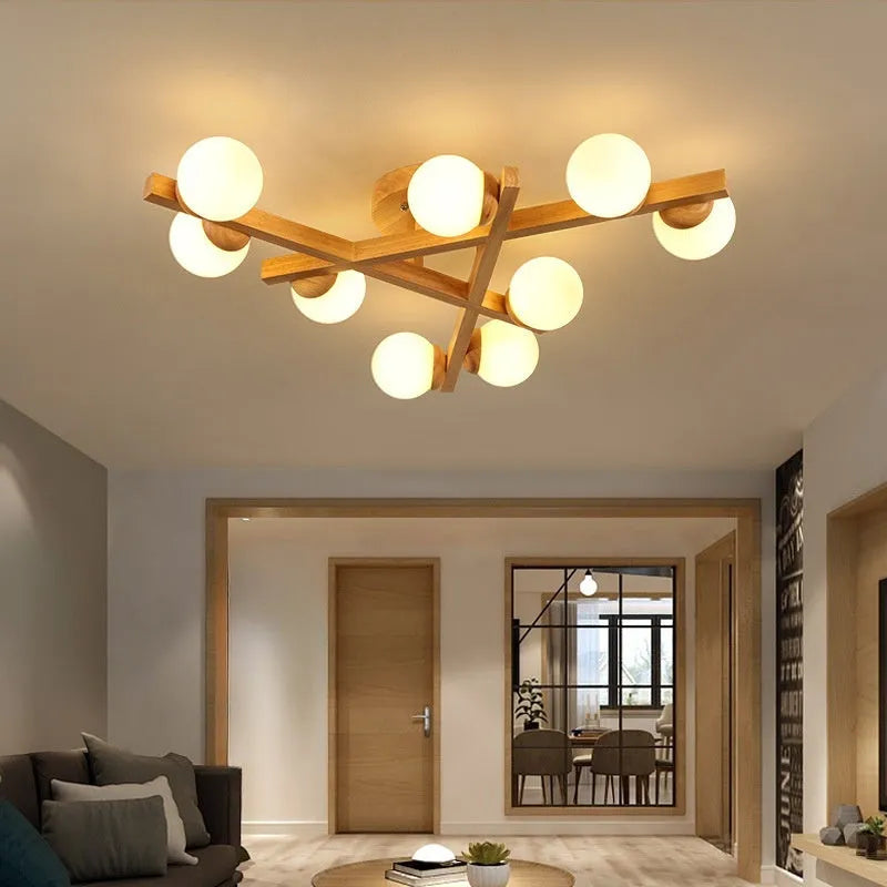 Nordic-style wooden effect ceiling light with three adjustable neutral white LED heads on angled arms.