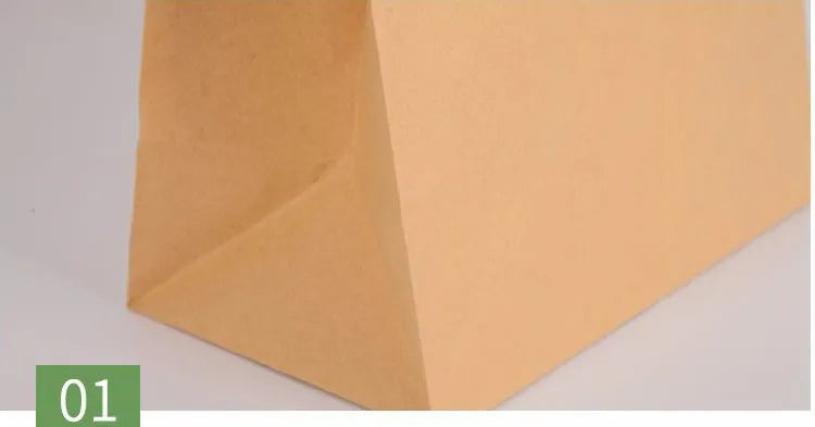 Yellow thickened kraft paper inner packaging bag with aluminium foil lining for snacks.