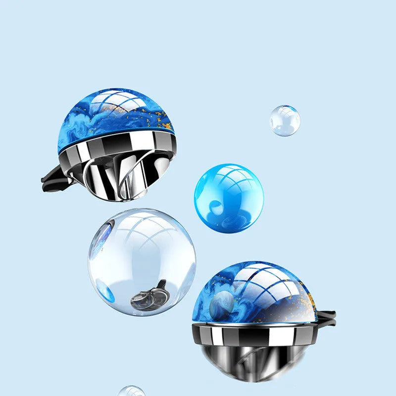 Planet-shaped car aromatherapy diffuser in gun black finish with ABS vacuum plating and two fragrance oil bottles