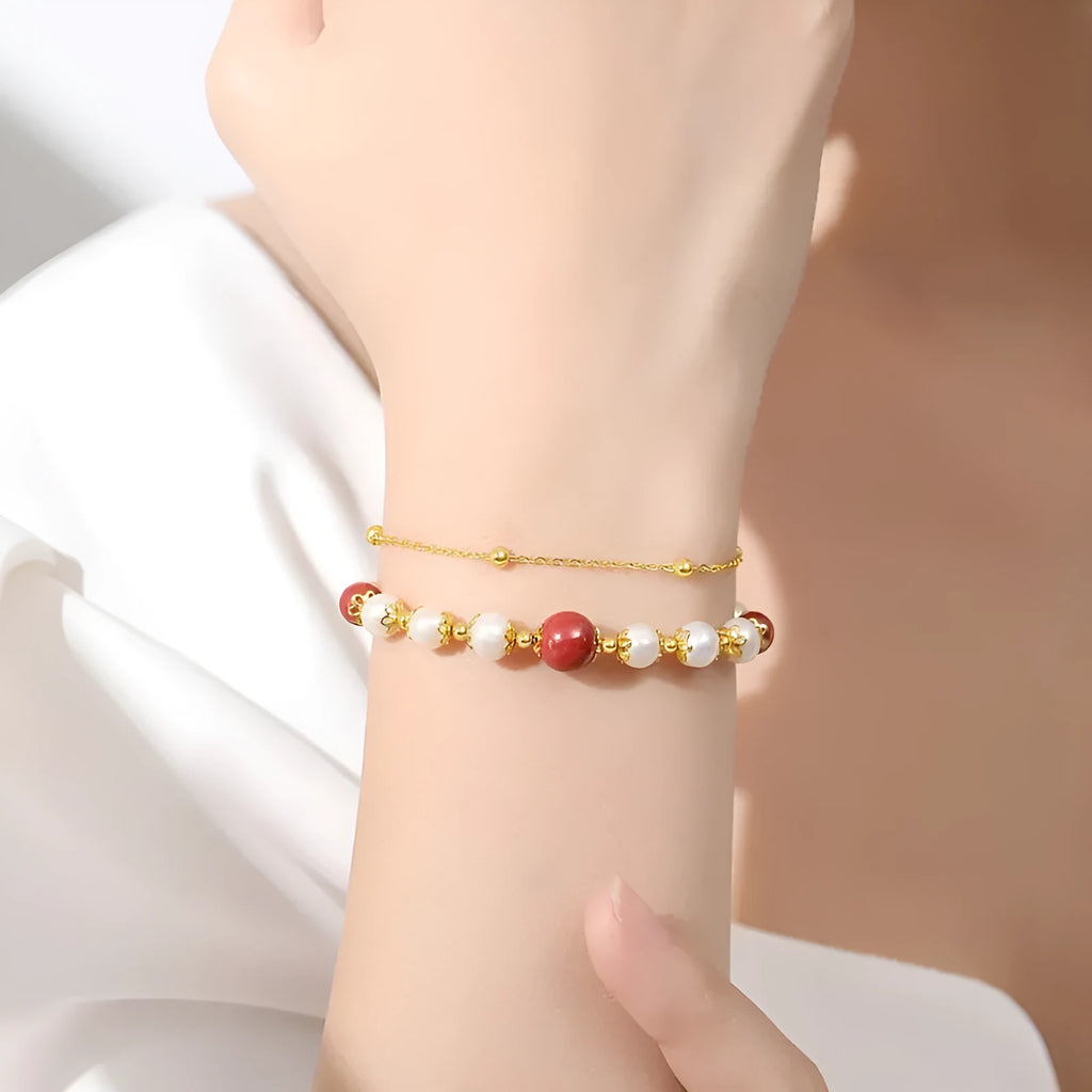 Sterling silver double layer bracelet with cinnabar red beans and white freshwater pearl charms