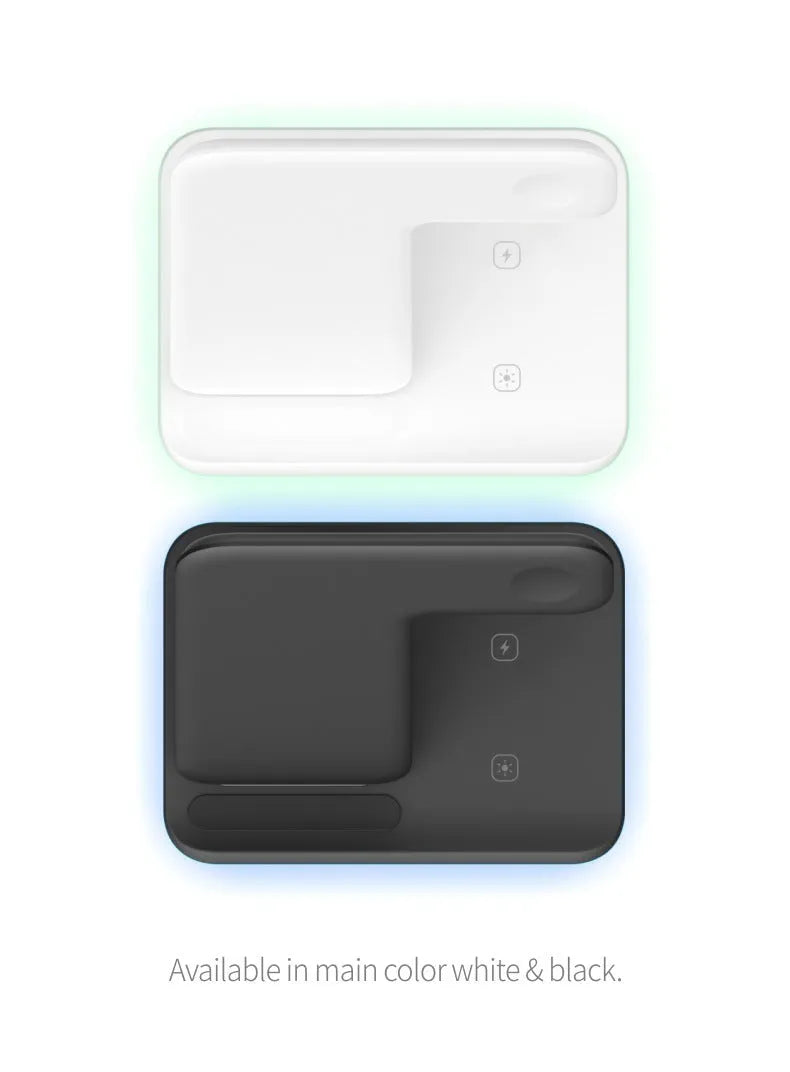 White three-in-one wireless charging stand for mobile phone, smartwatch, and headset on a desk.