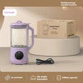 Milky white automatic cytoderm breaking soybean milk maker with glass body and touch control panel.
