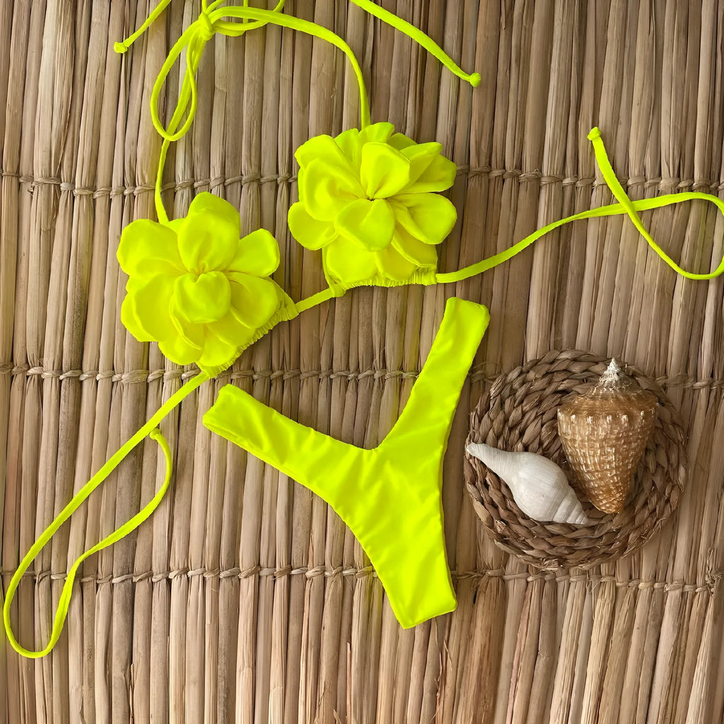 Three-dimensional 3D flower pattern on low waist bikini swimsuit in solid colour