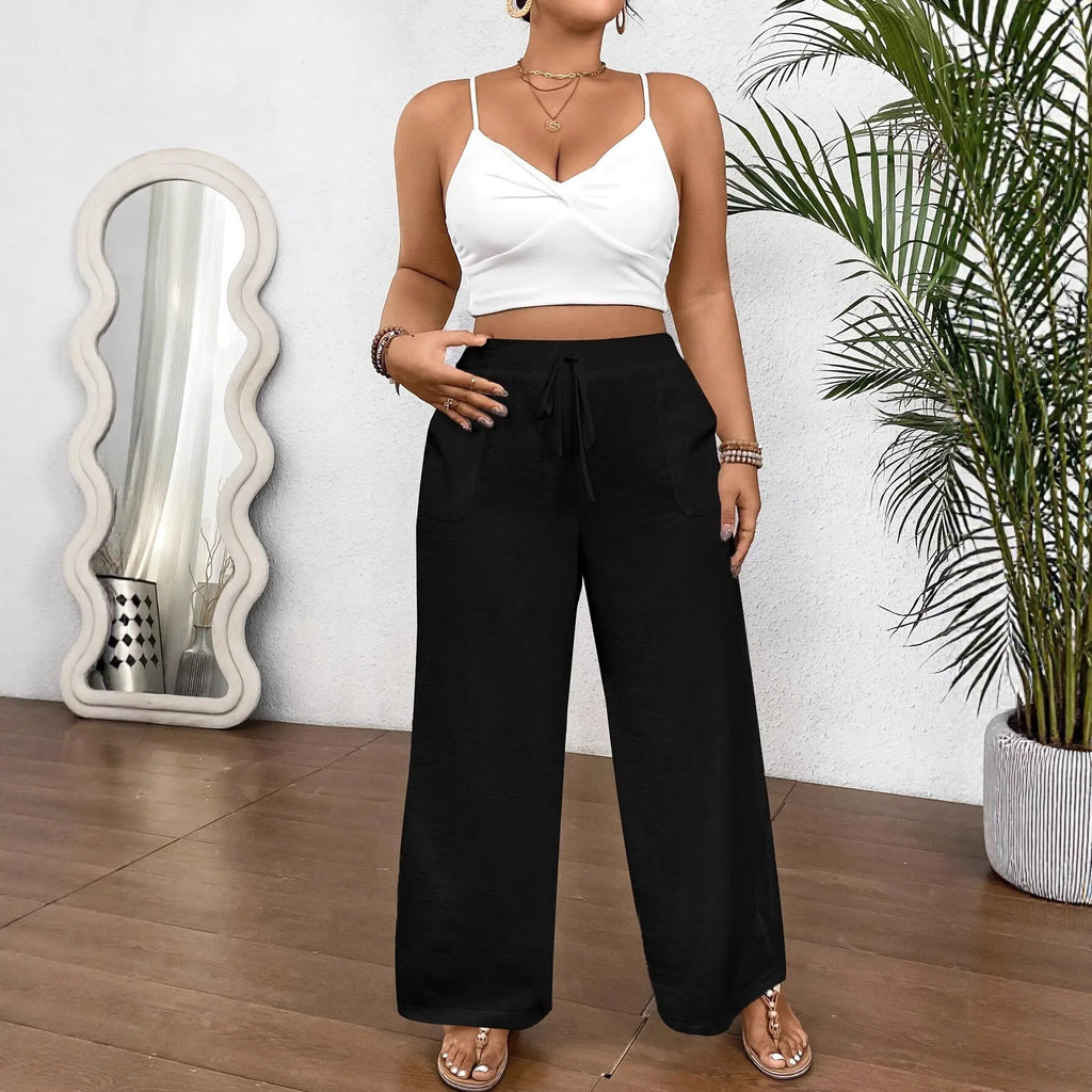 Drawstring wide leg loose fit women trousers in khaki colour with side pockets and drawstring waist.