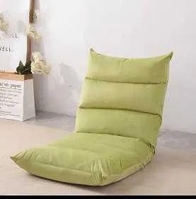 Beige lazy sofa floor chair with adjustable backrest on living room floor showing six-angle mechanism