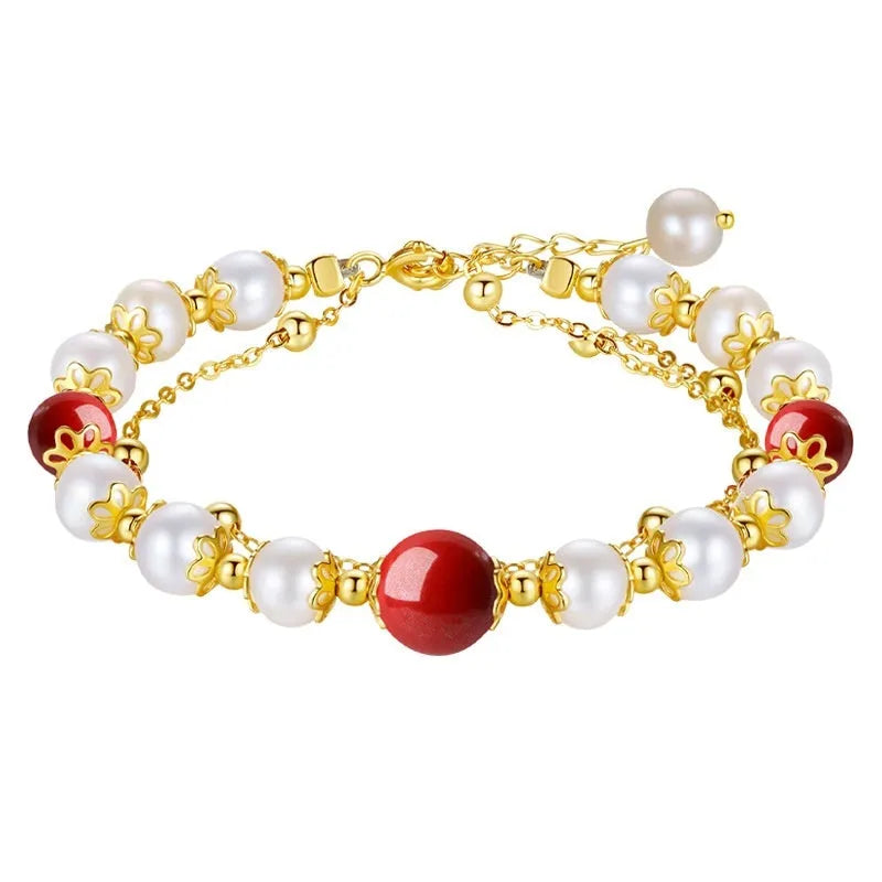 Sterling silver double layer bracelet with cinnabar red beans and white freshwater pearl charms