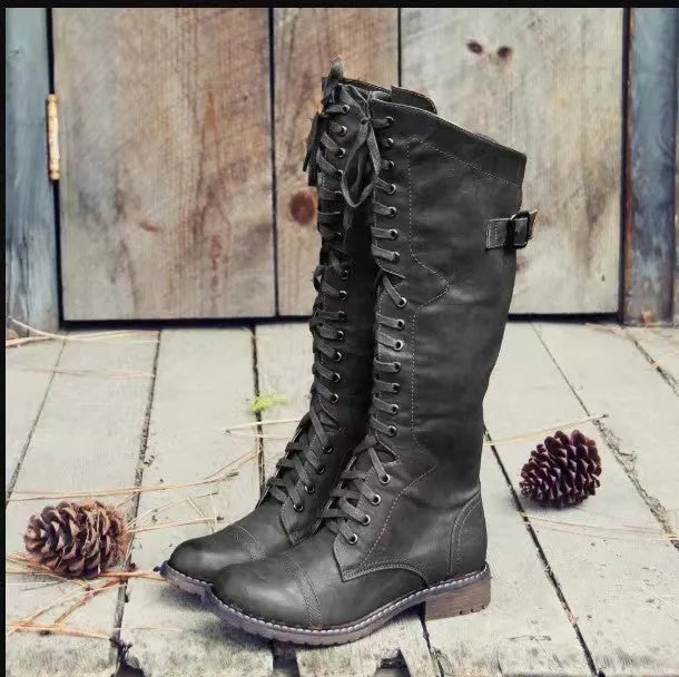 Women's black chunky heel ankle boots made of artificial PU leather with a round toe.