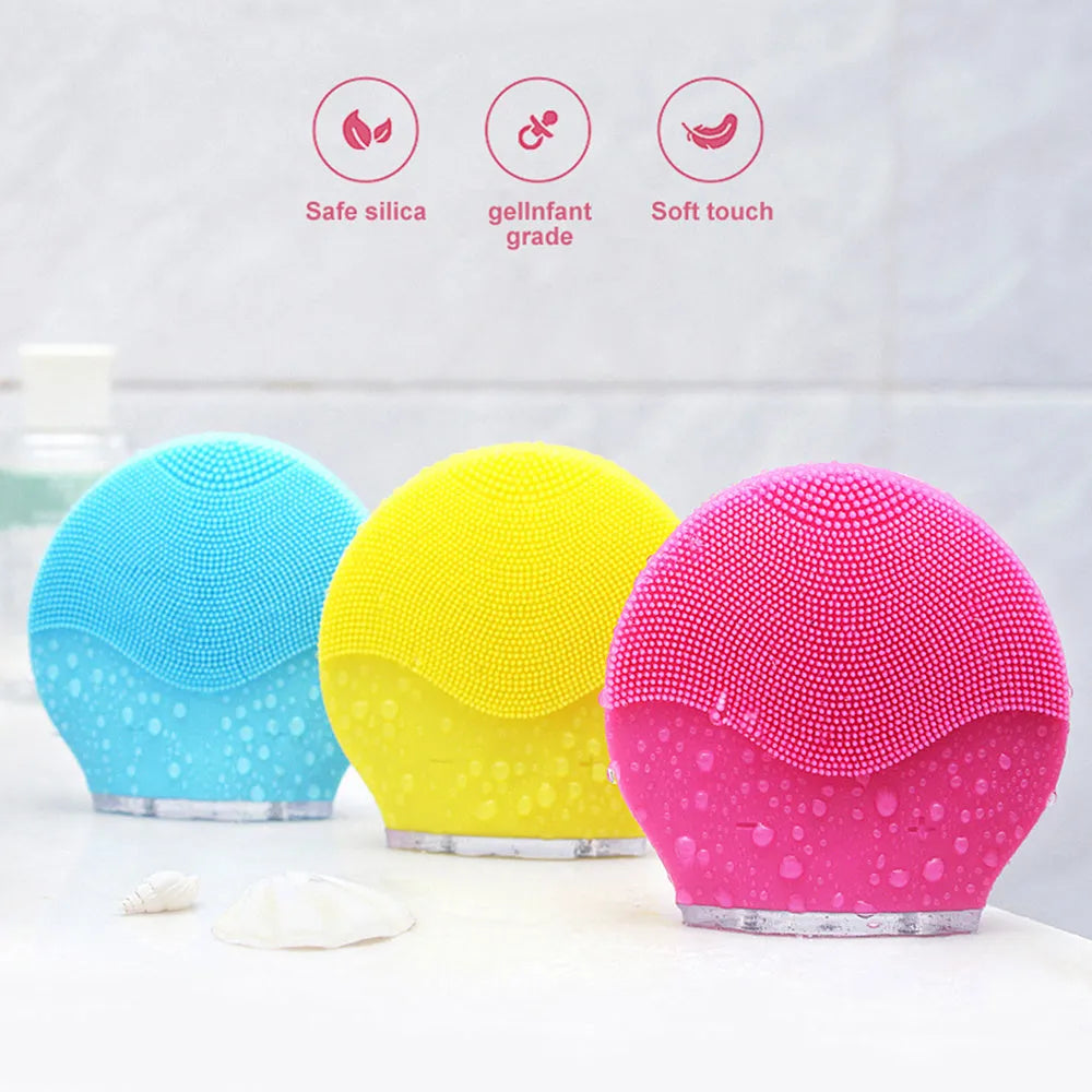 Electric waterproof silicone cleansing instrument mini facial brush in pink with USB cable
