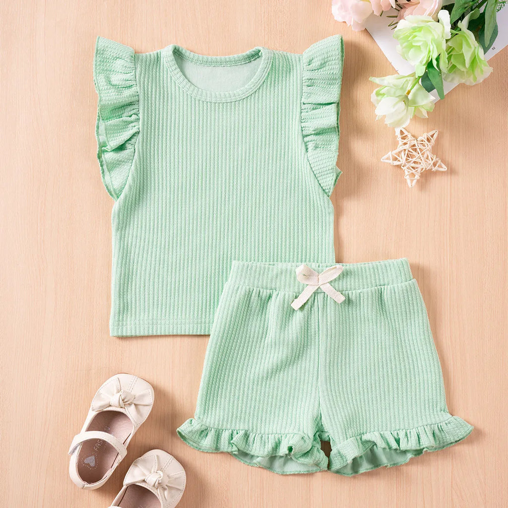 Girls' solid colour summer suit with flounced sleeves and shorts in knitted polyester for children 80-120cm