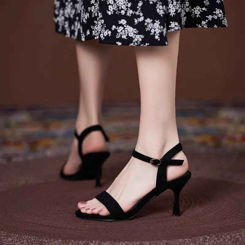 Women's one-strap PU leather sandals with low cat heel in apricot colour, side view